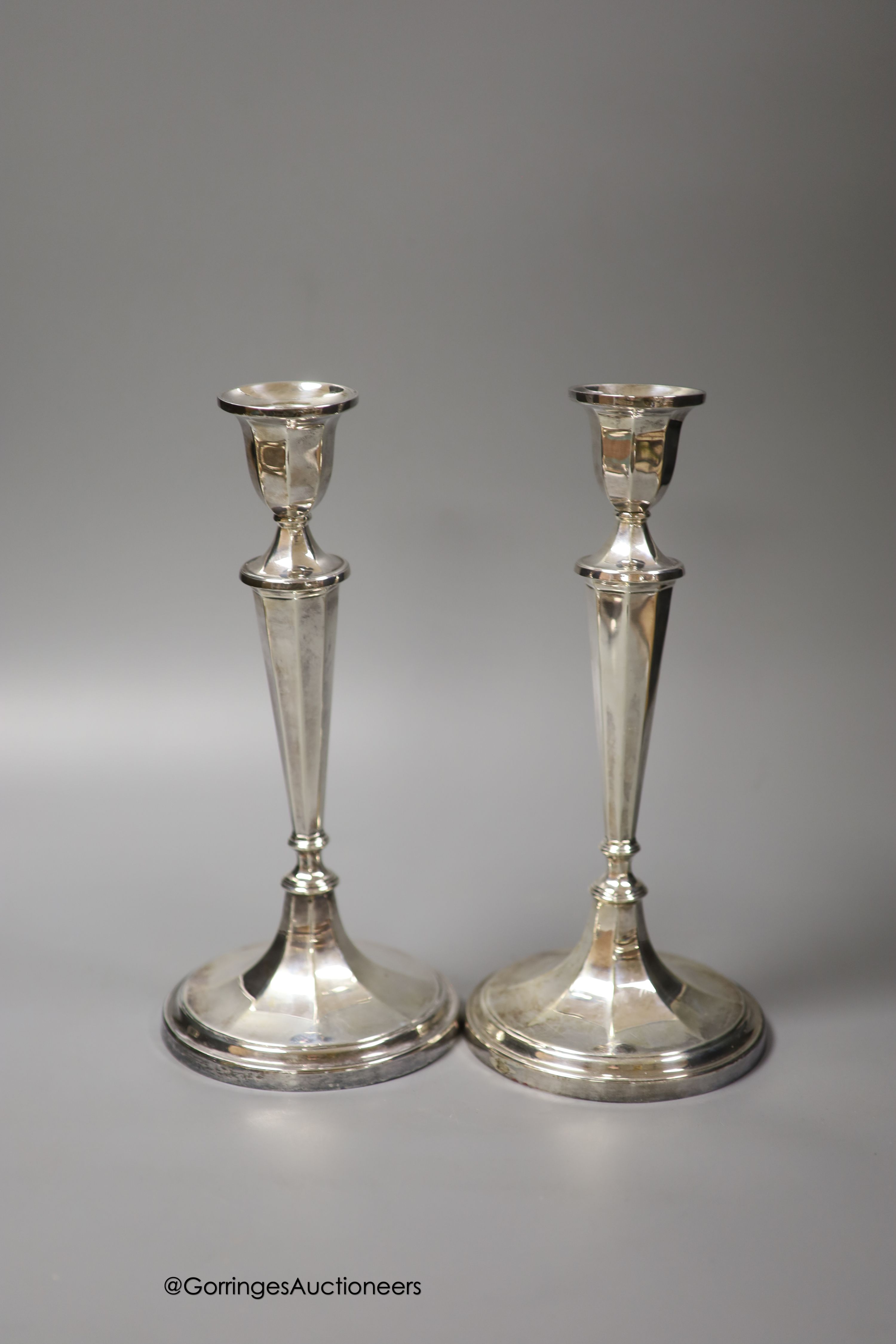 A modern pair of silver two branch, three light candelabra by C.J. Vander Ltd, Sheffield, 1962 & 1964, height 37cm, weighted (a.f.)